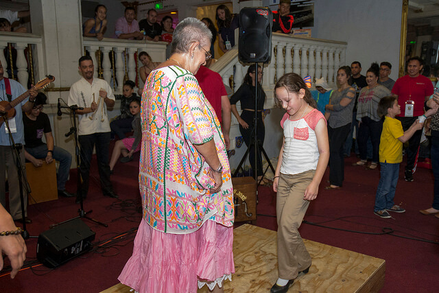 Maestra Maria Guadalupe Castro Paramo shares her moves with a young student.